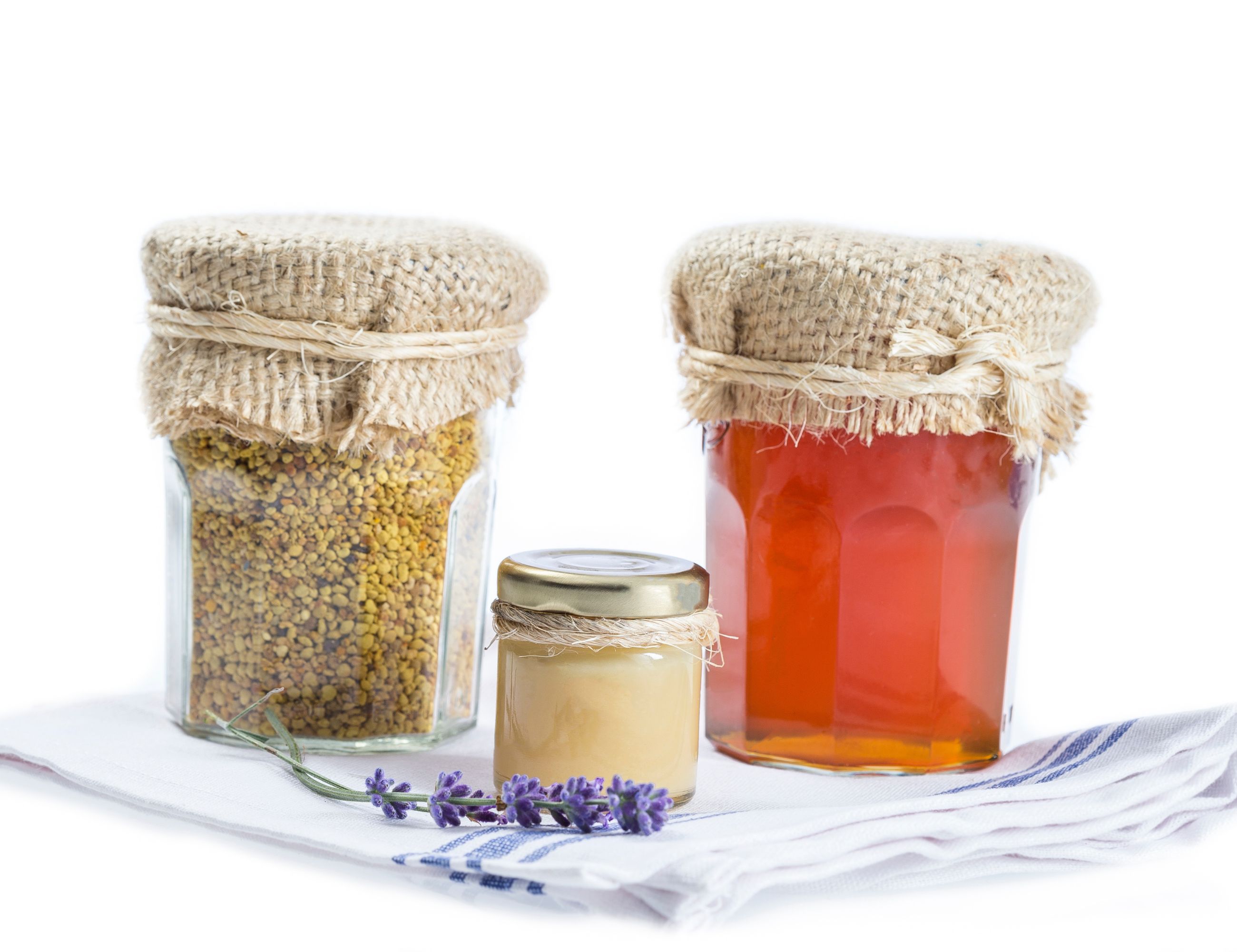 bee pollen, royal honey, raw honey in jars
